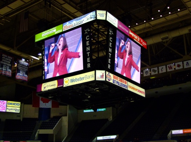 Val singing at the Hartford Wolf Pack Hockey game on April 19, 2014.
