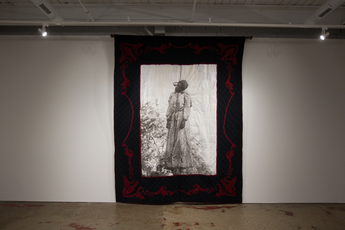 ”Quilt I, Her Name was Laura Nelson” explores issues around gender violence and familial bonds as they relate to lynching. Completed May 2004.