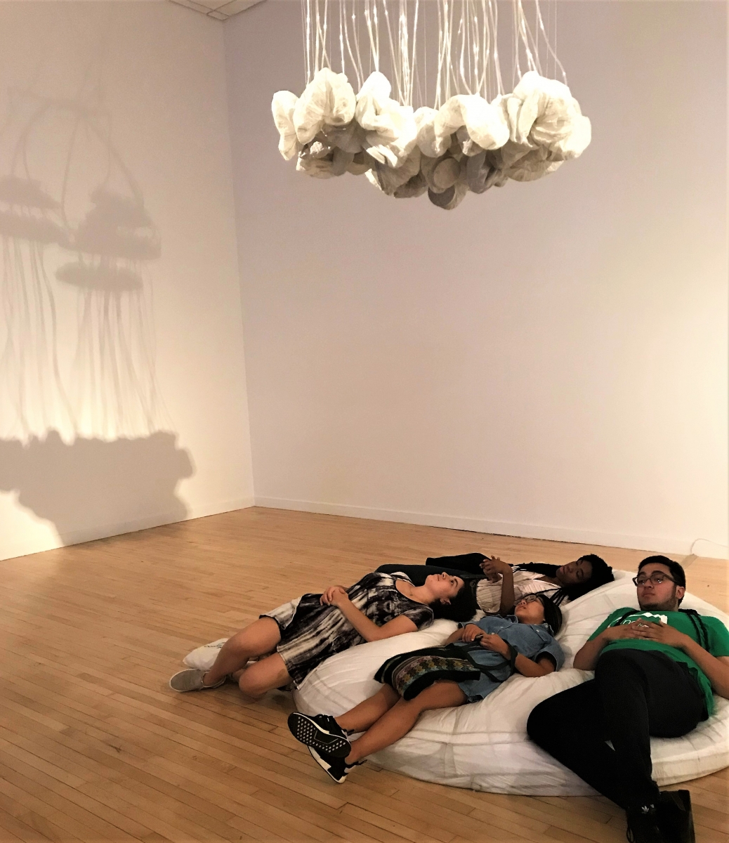 DIAL 2019 interns enjoying an interactive art exhibit during a site visit at The Bronx Museum, one of the arts host locations. Experiences like this will be difficult to facilitate in the virtual version of the internship. Photo by Ami Scherson.