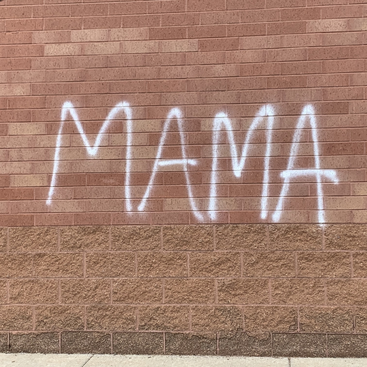 This simple text reading "Mama" was documented on June 2, 2020 on a former Walmart in the Midway neighborhood in Saint Paul, Minnesota. This wall was the epicenter of the uprisings in Saint Paul in response to the murder of George Floyd. 